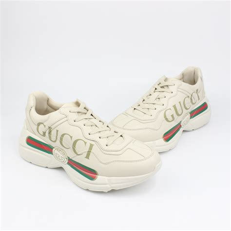 gucci rhyton sneaker logo.